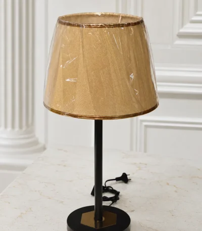 Modern black metal table lamp with a beige fabric lampshade, perfect for bedside tables, living rooms, offices, and contemporary home décor
