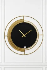 Modern black and gold wall clock with minimalist dial