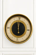 Vintage round wall clock with Roman numerals
