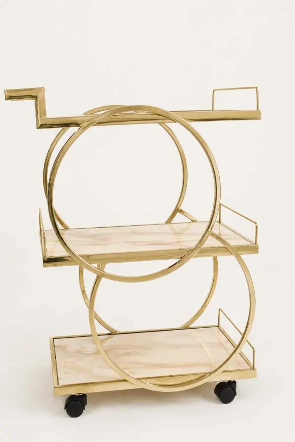 Glamorous geometric gold 3-tier bar cart showcasing an intersecting double circle frame, beige faux-marble shelves, and black rolling caster wheels over a clean white background.