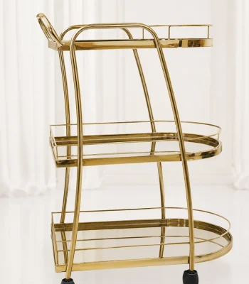 Premium oval gold 3-tier bar cart showcasing an elongated metallic frame, matching gold-mirrored shelves, an integrated push handle, and rolling caster wheels.