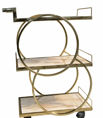 Geometric gold 3-tier drinks trolley featuring an intersecting circular metal frame, polished beige marble-effect shelves, a structured push handle, and black rolling caster wheels.