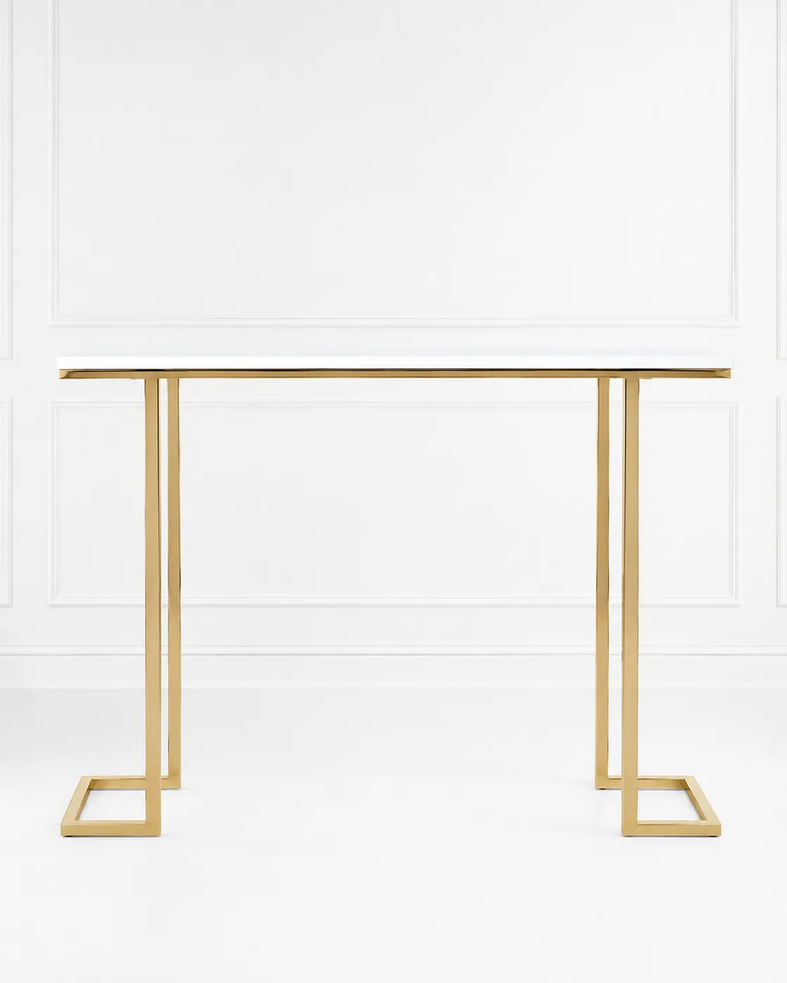 Modern Gold Console Table with Faux Marble White Top – Geometric Minimalist Entryway & Living Room Sofa Table Modern gold console table with a minimalist white top and geometric metal frame legs, set against a clean white wall paneling backdrop.