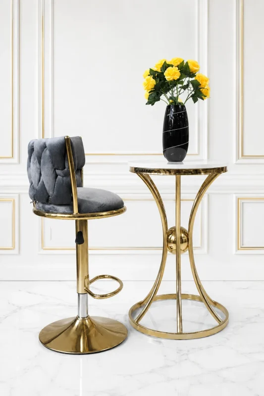 Grey velvet swivel bar stool with gold stainless steel base