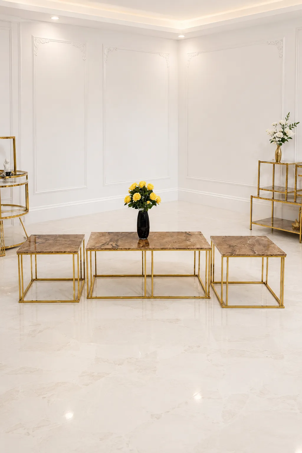 Luxury Modern Marble Coffee Table Set with Gold Geometric Frames coffee table set featuring a rectangular coffee table and two square side tables with brown marble tops and gold frames in a luxury white room.