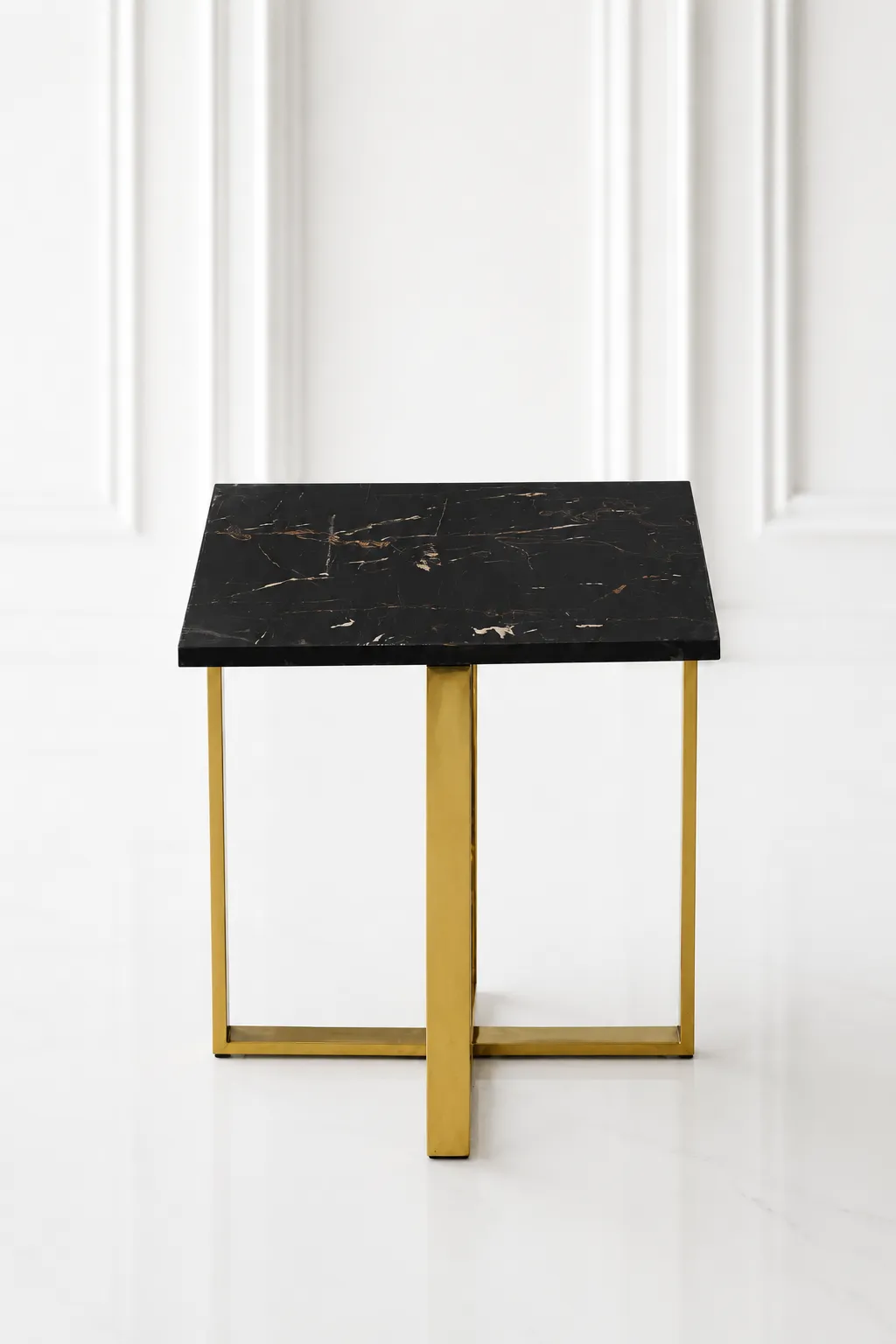 Contemporary Square Black Marble End Table with Polished Gold X-Base Frame Minimalist square black marble end table showcasing a polished gold stainless steel X-frame base