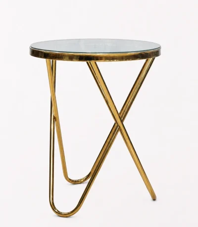 Luxury round glass top side table with gold slatted cage base and an intersecting cross foundation.