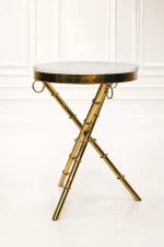 Luxury round white marble top side table with gold tripod base featuring textured bamboo-style legs and ring accents
