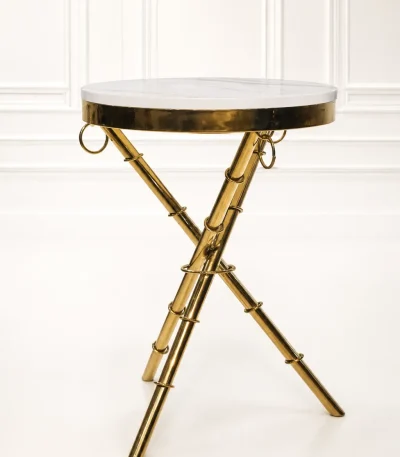 Luxury round white marble top side table with gold tripod base featuring textured bamboo-style legs and ring accents