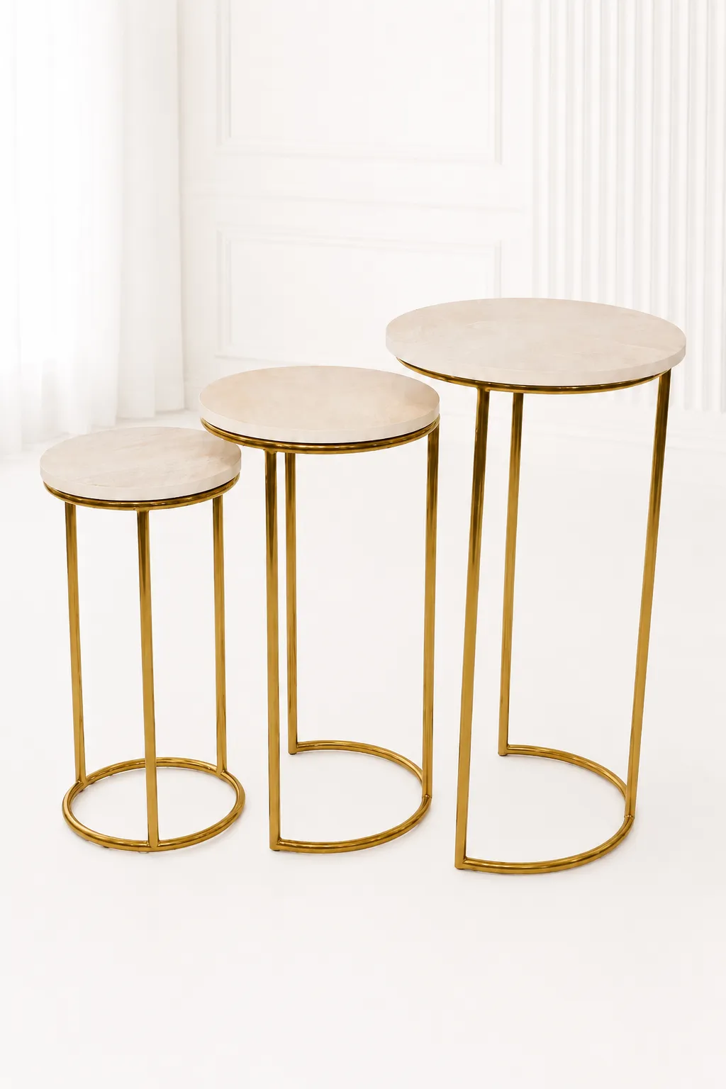 Luxury Round Marble Nesting Tables with Gold Frame – Modern Space-Saving End Tables Set of three luxury round marble nesting tables with gold frame arranged in a staggered, descending layout,