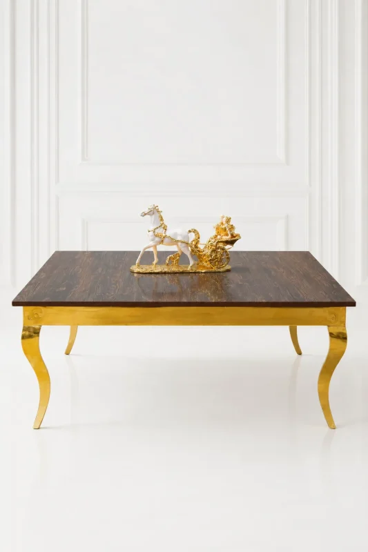 Luxury square dark wood coffee table with gold cabriole legs featuring a textured dark wood top styled with a gold horse sculpture