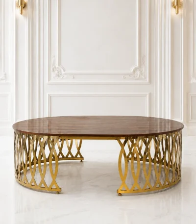 Luxury round wood coffee table with gold latticework base featuring a polished dark brown walnut grain top and a laser-cut metal trellis frame