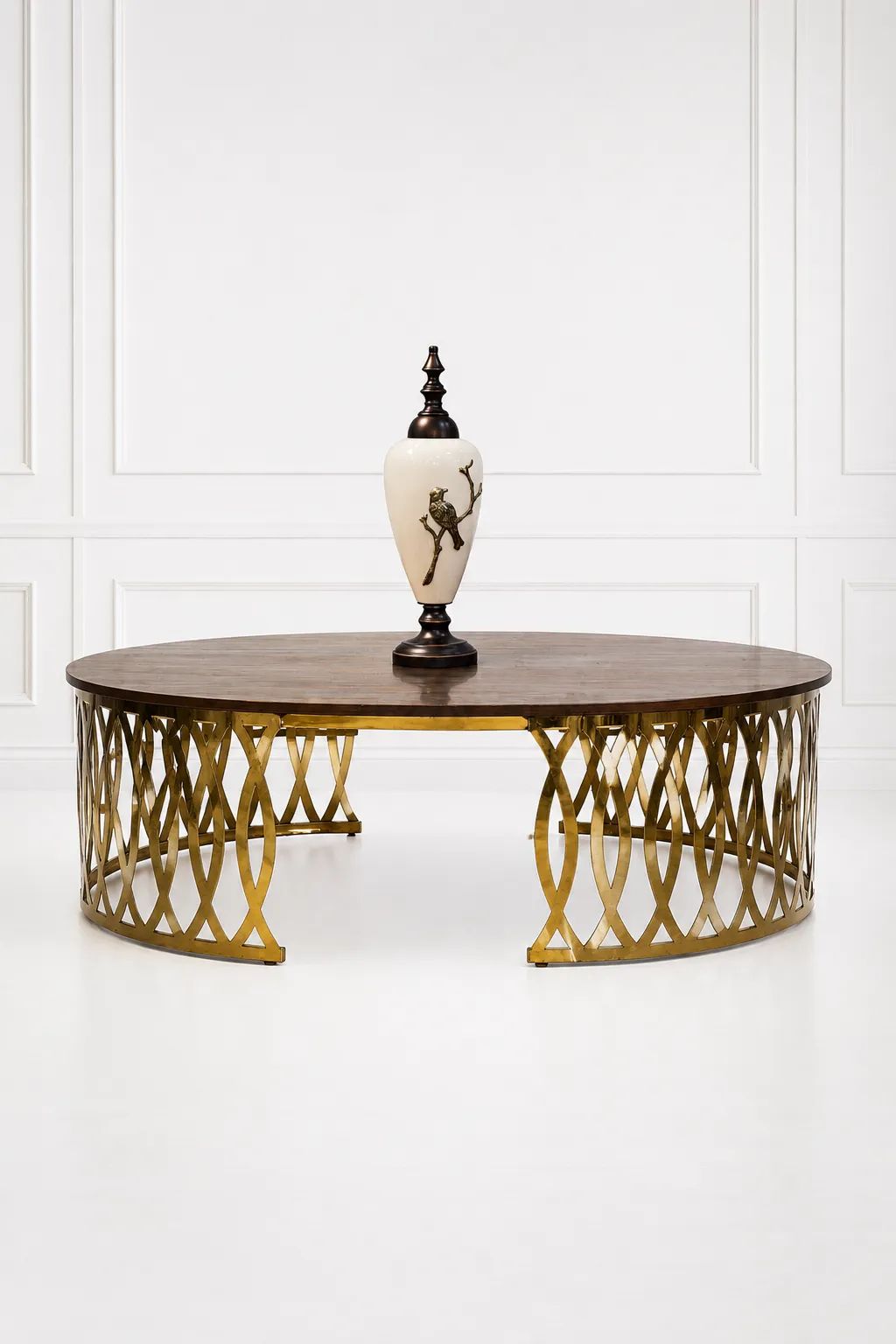 Luxury Round Wood Coffee Table with Gold Latticework Base – Modern Open-Front Laser Cut Center Table Luxury round wood coffee table with gold latticework base featuring a polished dark brown walnut grain top styled with a decorative white porcelain urn vase,