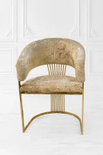 Luxury barrel accent chair with a metallic gold marble pattern fabric, supported by a polished gold stainless steel frame featuring vertical back slats and a curved base.