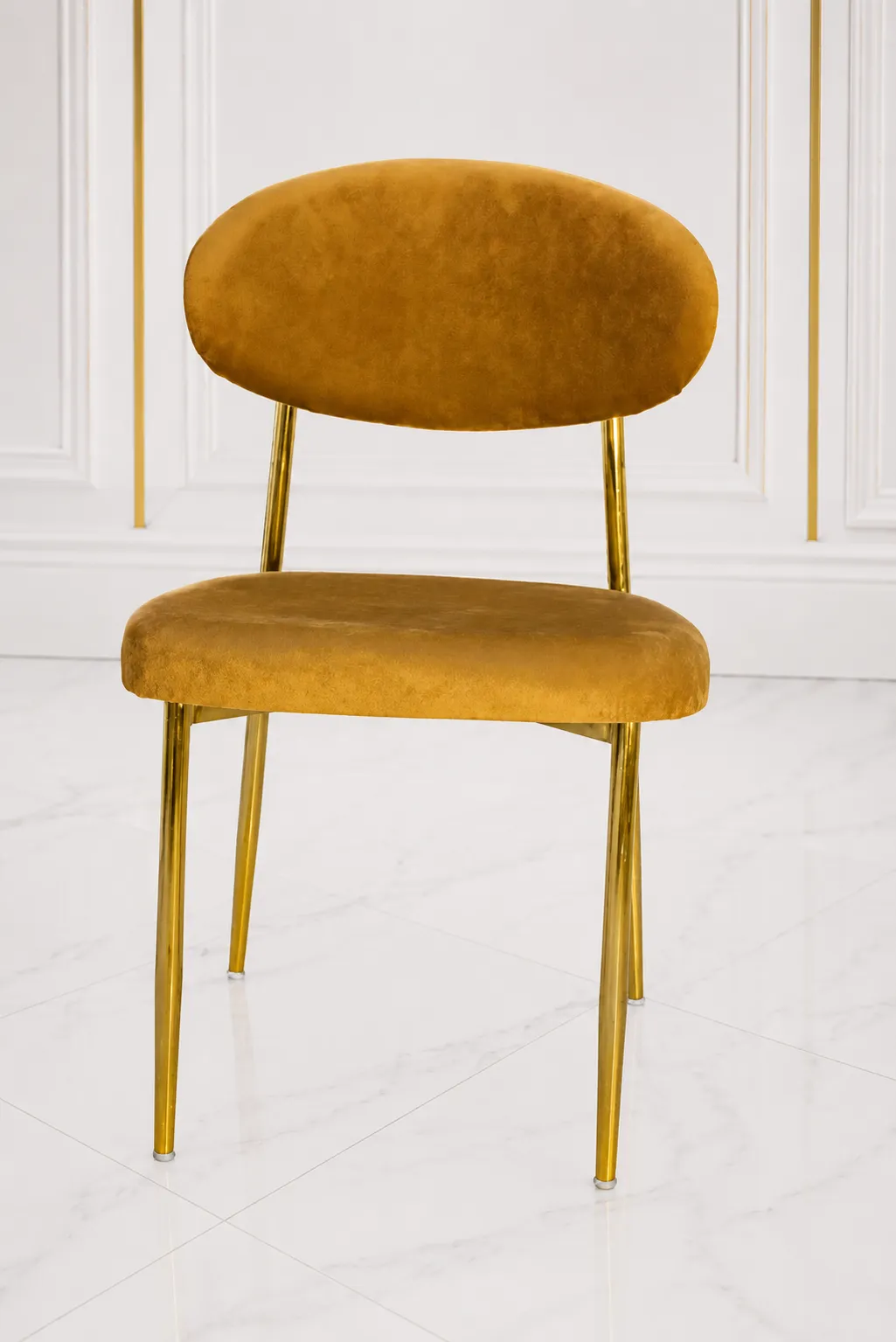 Luxury Mustard Velvet Dining Chair with Gold Metal Legs | Modern Upholstered Accent Chair Luxury mustard velvet dining chair with gold metal legs for modern dining rooms and stylish interiors.
