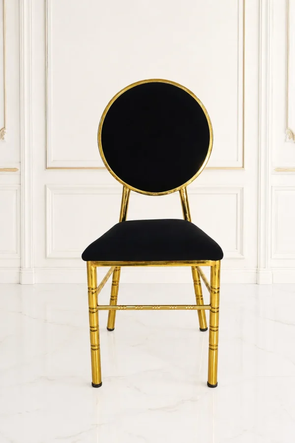 Luxury gold banquet chair with black velvet seat and round backrest for wedding and hotel seating.