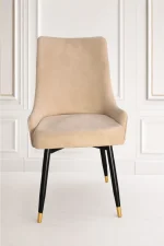 Modern beige velvet dining chair with black metal legs