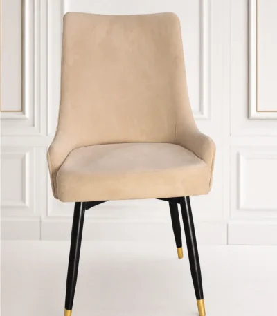Modern beige velvet dining chair with black metal legs