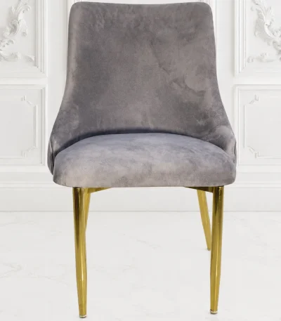 Grey velvet dining chair with polished gold metal legs