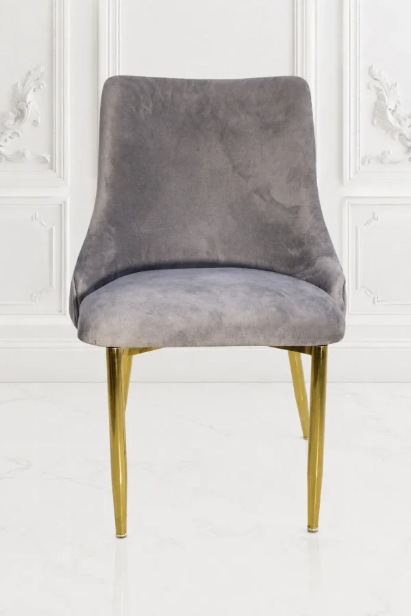Grey velvet dining chair with polished gold metal legs