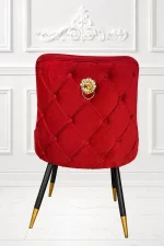 Luxury upholstered red velvet dining chair for modern home interiors.