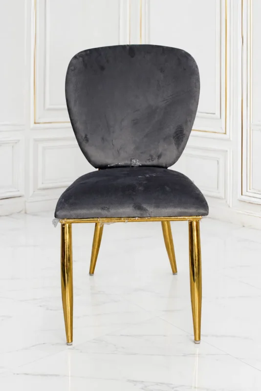 Grey velvet dining chair with gold metal legs