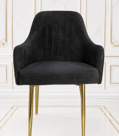 Black velvet dining armchair with gold metal legs