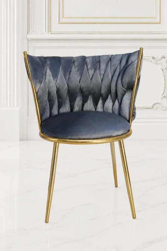 Grey velvet dining chair with gold metal frame and diamond pleated back