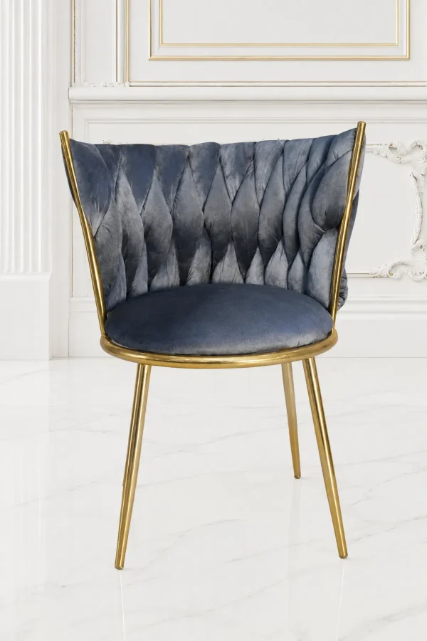 Grey velvet dining chair with gold metal frame and diamond pleated back