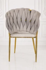 Modern upholstered dining chair in beige velvet