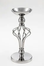Contemporary silver pillar candle holder featuring a wide top bowl, an open twisted metallic cage stem, and a flat reflective circular base on a white backdrop.