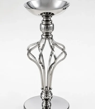 Contemporary silver pillar candle holder featuring a wide top bowl, an open twisted metallic cage stem, and a flat reflective circular base on a white backdrop.