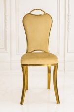 Luxury beige velvet dining chair with gold stainless steel frame and high back.