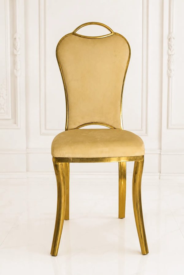 Luxury beige velvet dining chair with gold stainless steel frame and high back.