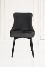 Modern dark grey velvet dining chair with diamond quilted backrest.