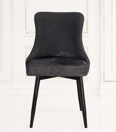 Modern dark grey velvet dining chair with diamond quilted backrest.