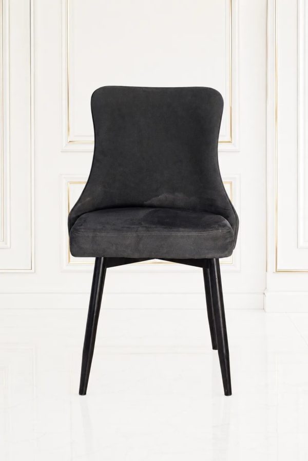 Modern dark grey velvet dining chair with diamond quilted backrest.