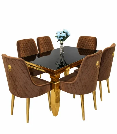 Luxury gold dining table set with black tabletop and brown diamond-quilted upholstered chairs featuring elegant gold-finish legs.