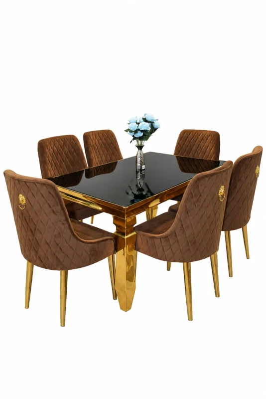 Luxury gold dining table set with black tabletop and brown diamond-quilted upholstered chairs featuring elegant gold-finish legs.